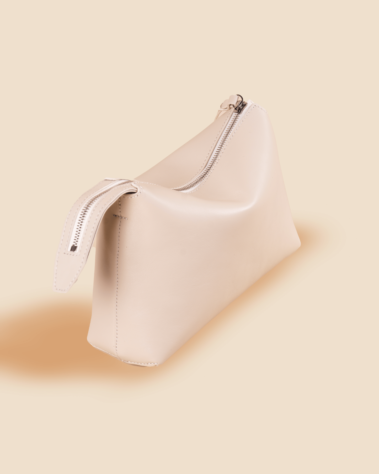 pietro-us.pro The Hudson Clutch Almond Leather Bag